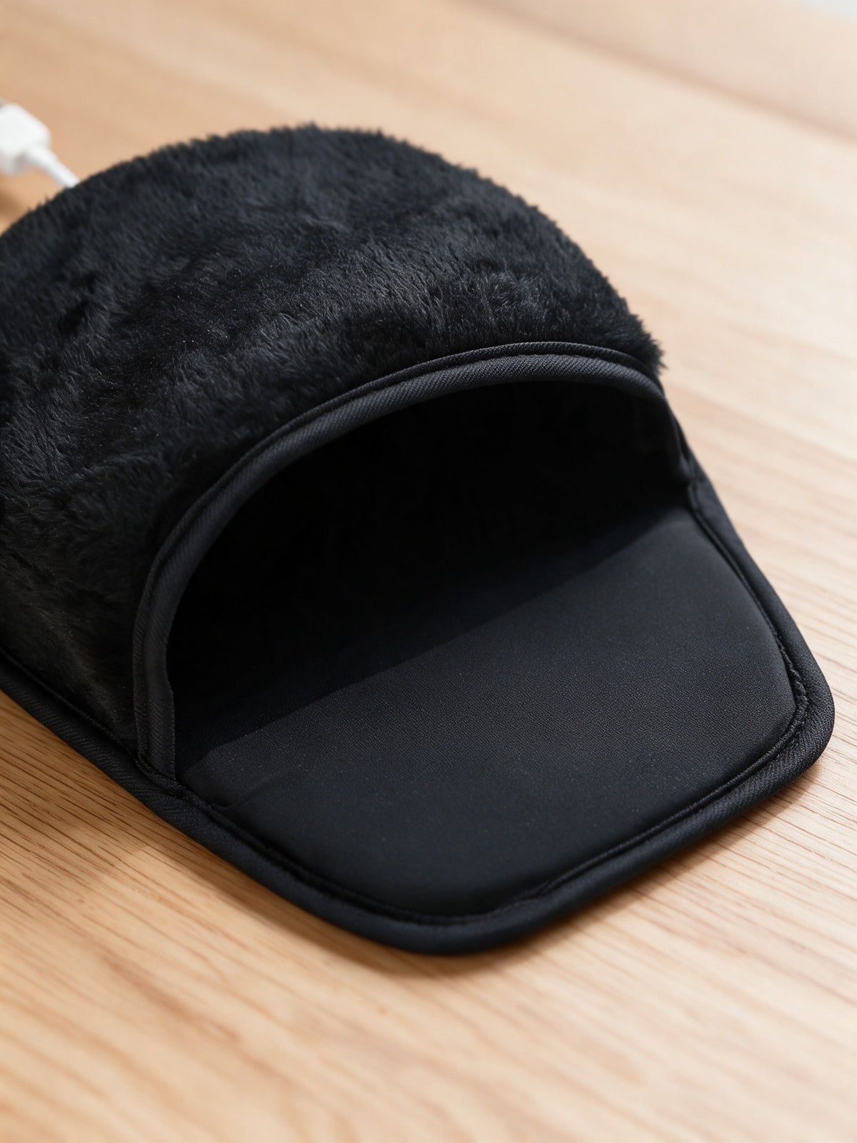 USB Heated Mouse Pad with Plush Hand Warmer Cover — close-up of the plush hand-warmer pocket and stitched edge
