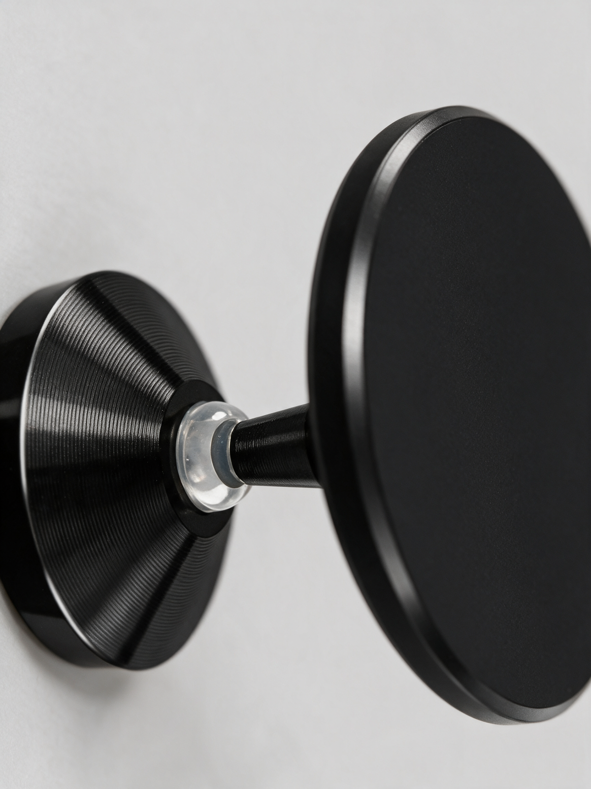 Magnetic Gym Phone Mount — close-up of the magnetic disc, ball joint and brushed aluminium base